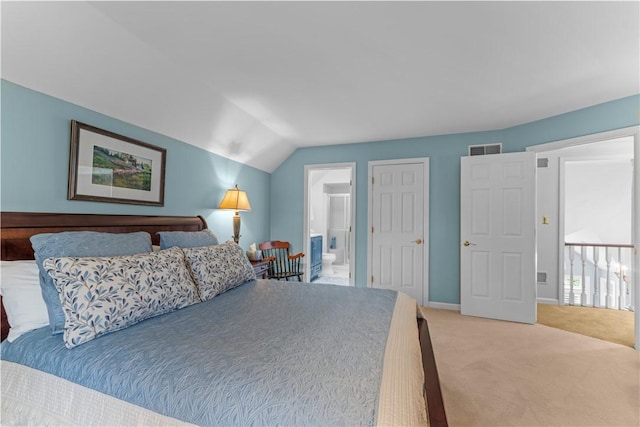 1055 Saint Mellion Dr, Collier Twp, PA 15142 - bedroom featuring light colored carpet, lofted ceiling, and ensuite bath