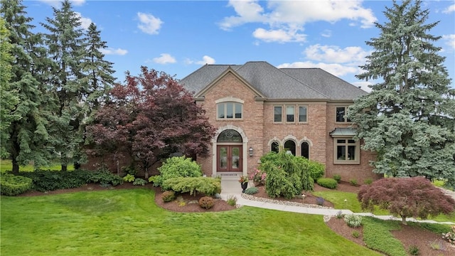 1055 Saint Mellion Dr, Collier Twp, PA 15142 - colonial home with french doors, brick siding, and a front lawn