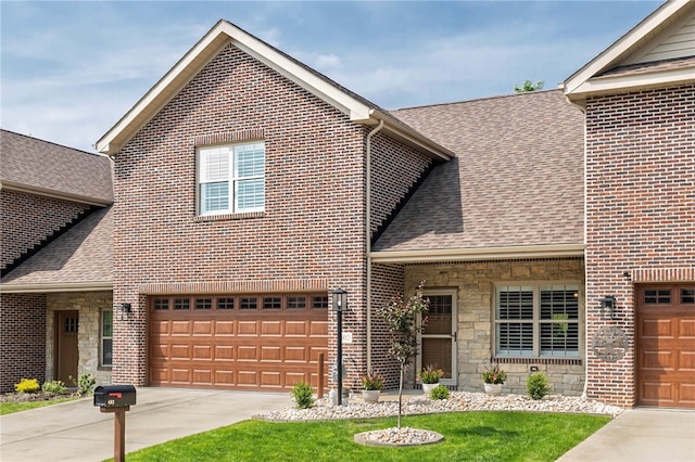 402 Chambers Dr, Canton Twp, PA 15301 - view of front of property with a shingled roof, stone siding, and concrete driveway