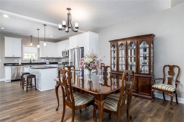 402 Chambers Dr, Canton Twp, PA 15301 - dining room with a chandelier, dark wood-type flooring, and recessed lighting