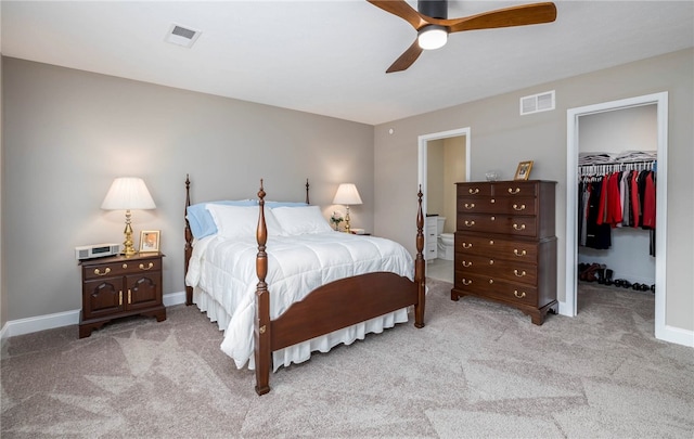 402 Chambers Dr, Canton Twp, PA 15301 - bedroom with light colored carpet, a walk in closet, a closet, and a ceiling fan
