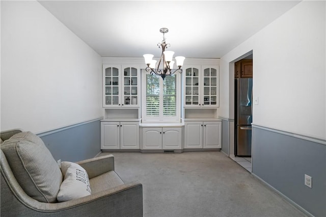 126 Penn Lear Dr, Monroeville, PA 15146 - sitting room with a chandelier and light colored carpet