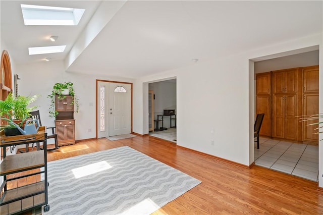 126 Penn Lear Dr, Monroeville, PA 15146 - foyer entrance featuring a skylight and light wood-type flooring