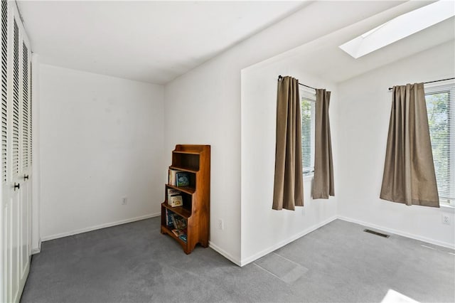 126 Penn Lear Dr, Monroeville, PA 15146 - carpeted empty room featuring a skylight and baseboards