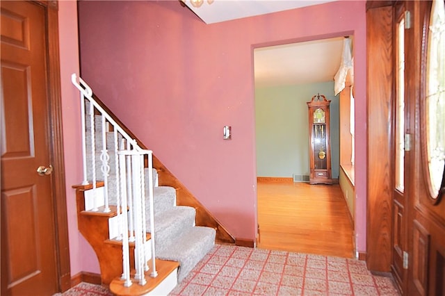 714 Colonial, Coolbaugh Twp, PA 15613 - foyer entrance featuring stairway and wood finished floors