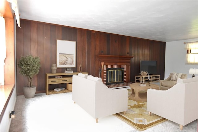 714 Colonial, Coolbaugh Twp, PA 15613 - living area featuring wood walls, a brick fireplace, and light carpet