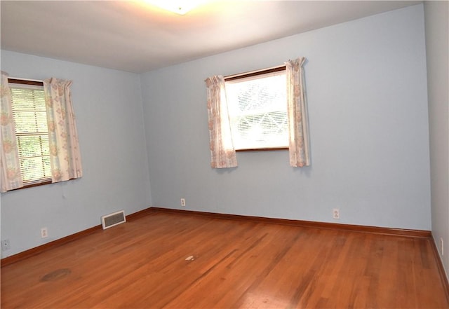 714 Colonial, Coolbaugh Twp, PA 15613 - empty room featuring wood finished floors