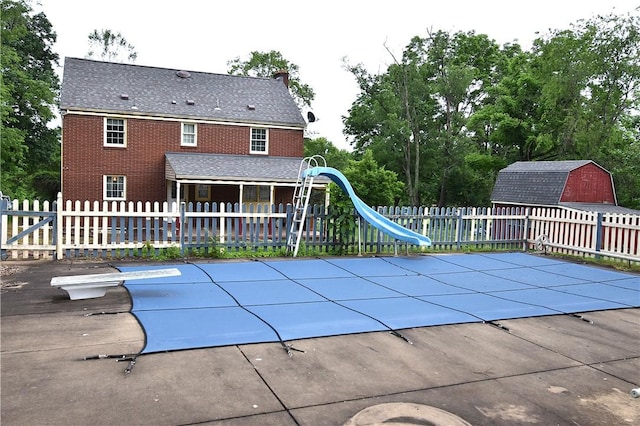 714 Colonial, Coolbaugh Twp, PA 15613 - view of swimming pool featuring a shed