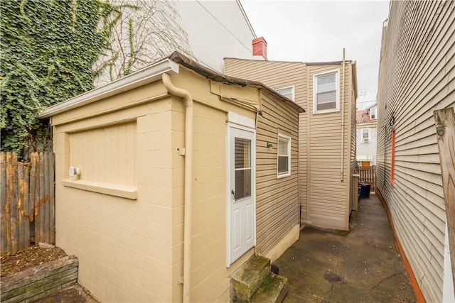 159 S 16th St, South Side, PA 15203 - view of property exterior with concrete block siding and an outdoor structure