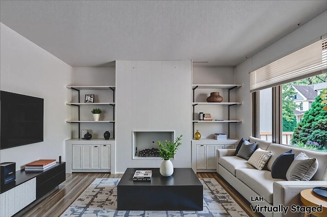 538 Maplewood Ave, Ambridge, PA 15003 - living room featuring wood finished floors and a textured ceiling