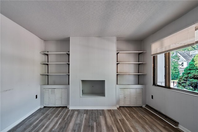 538 Maplewood Ave, Ambridge, PA 15003 - unfurnished living room featuring wood finished floors and a textured ceiling