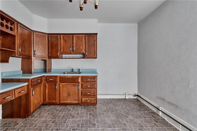 538 Maplewood Ave, Ambridge, PA 15003 - kitchen with open shelves, light countertops, a chandelier, and brown cabinetry