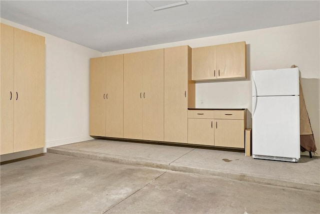 560 Madison Blvd, New Sewickley Twp, PA 15042 - garage with freestanding refrigerator and baseboards