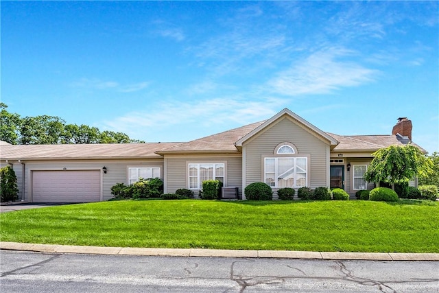 560 Madison Blvd, New Sewickley Twp, PA 15042 - ranch-style home with a garage, a front lawn, a chimney, and driveway