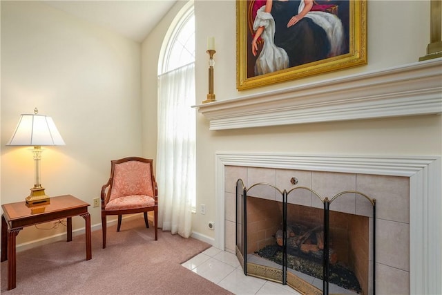 560 Madison Blvd, New Sewickley Twp, PA 15042 - living area with a tile fireplace, vaulted ceiling, carpet floors, and tile patterned flooring