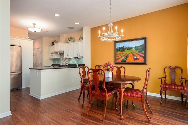 560 Madison Blvd, New Sewickley Twp, PA 15042 - dining area featuring dark wood finished floors, a chandelier, and recessed lighting