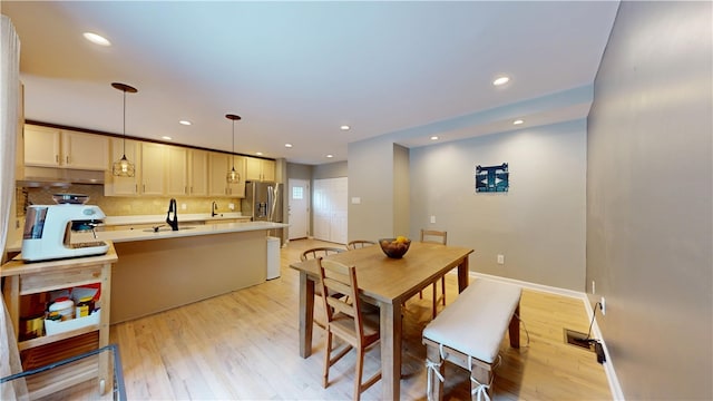 5445 Covode Pl, Squirrel Hill, PA 15217 - dining space featuring light wood finished floors and recessed lighting