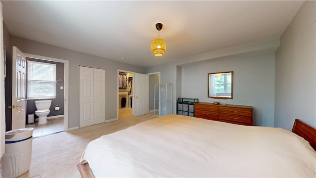 5445 Covode Pl, Squirrel Hill, PA 15217 - bedroom with light colored carpet and ensuite bathroom