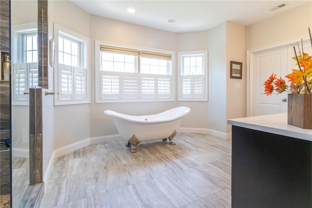 203 Ironwood Ct, Peters Twp, PA 15367 - bathroom with a freestanding bath, vanity, a shower, and recessed lighting