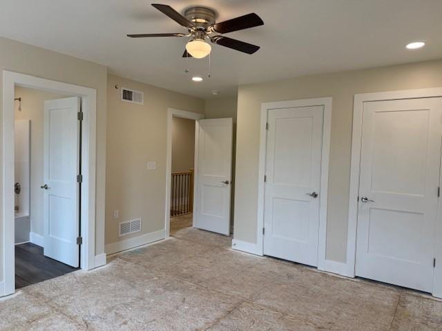 3273 Brodhead Rd Unit D, Center Twp Bea, PA 15001 - unfurnished bedroom featuring two closets, recessed lighting, connected bathroom, and a ceiling fan