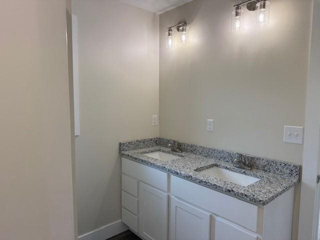 3273 Brodhead Rd Unit D, Center Twp Bea, PA 15001 - bathroom featuring baseboards and double vanity