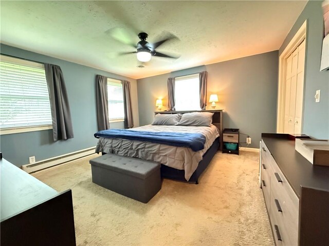 84 Williamson Rd, Hempfield Twp Mer, PA 16125 - bedroom with a baseboard radiator, light colored carpet, and a ceiling fan