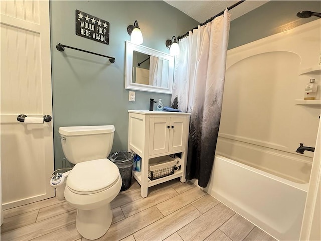 84 Williamson Rd, Hempfield Twp Mer, PA 16125 - bathroom featuring wood tiled floors, vanity, and shower / tub combo with curtain