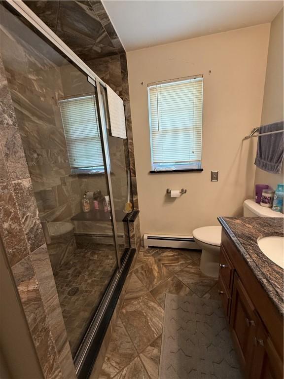 570 Hancock St, Cherryhll Twp/Clymer, PA 15728 - full bathroom featuring a baseboard radiator, a stall shower, vanity, and marble finish flooring