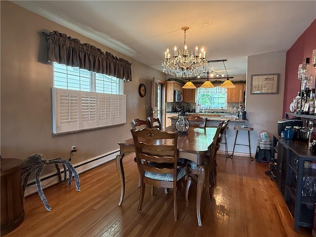 570 Hancock St, Cherryhll Twp/Clymer, PA 15728 - dining space with a chandelier and hardwood / wood-style floors