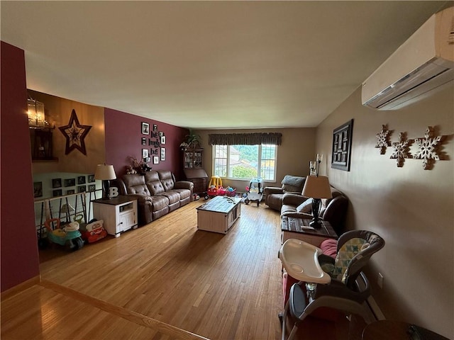 570 Hancock St, Cherryhll Twp/Clymer, PA 15728 - living room featuring an AC wall unit and wood finished floors