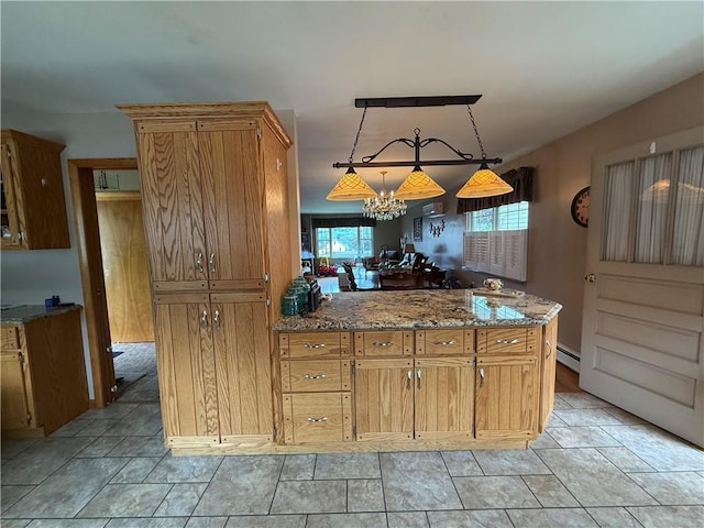 570 Hancock St, Cherryhll Twp/Clymer, PA 15728 - kitchen featuring a chandelier, stone counters, baseboard heating, a peninsula, and hanging light fixtures