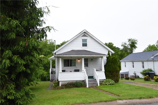 117 Oregon Ave, Vandergrift Wml, PA 15690 - view of front facade with a front yard and a porch