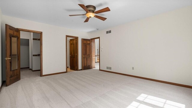 105 Bristol Sq, Ohara, PA 15238 - unfurnished bedroom featuring a spacious closet, light colored carpet, a closet, and ceiling fan