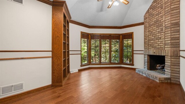 105 Bristol Sq, Ohara, PA 15238 - unfurnished living room with a ceiling fan, a fireplace, wood finished floors, ornamental molding, and high vaulted ceiling