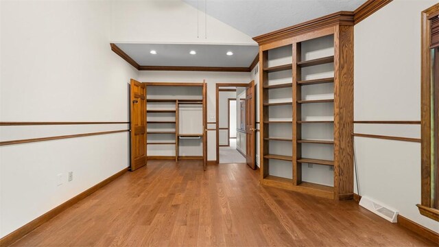 105 Bristol Sq, Ohara, PA 15238 - walk in closet featuring wood finished floors and vaulted ceiling