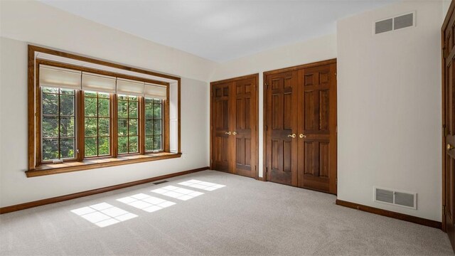 105 Bristol Sq, Ohara, PA 15238 - unfurnished bedroom with light carpet and multiple closets