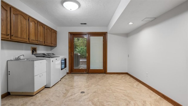 105 Bristol Sq, Ohara, PA 15238 - washroom featuring cabinet space, washer and clothes dryer, and a textured ceiling