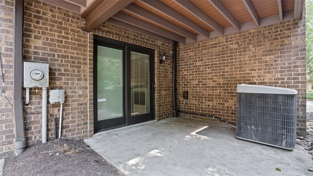 105 Bristol Sq, Ohara, PA 15238 - view of exterior entry with brick siding and a patio