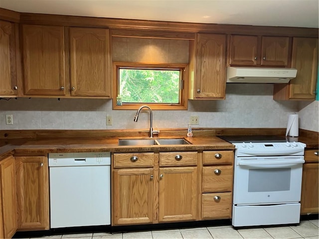 113 Filer Ln, Clay Twp, PA 16001 - kitchen with white appliances, exhaust hood, dark countertops, and light tile patterned floors