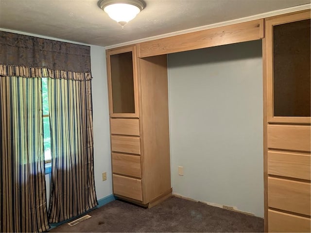 113 Filer Ln, Clay Twp, PA 16001 - unfurnished bedroom featuring dark carpet and a closet