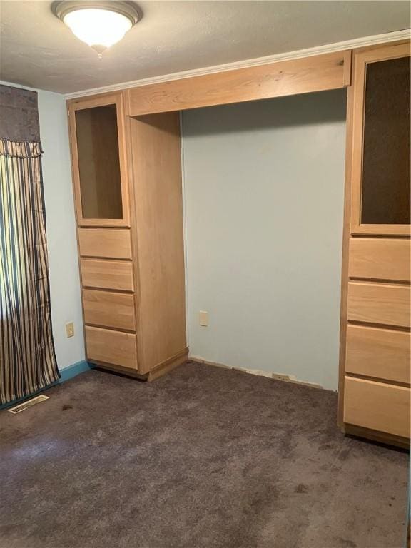 113 Filer Ln, Clay Twp, PA 16001 - unfurnished bedroom featuring dark colored carpet and a closet