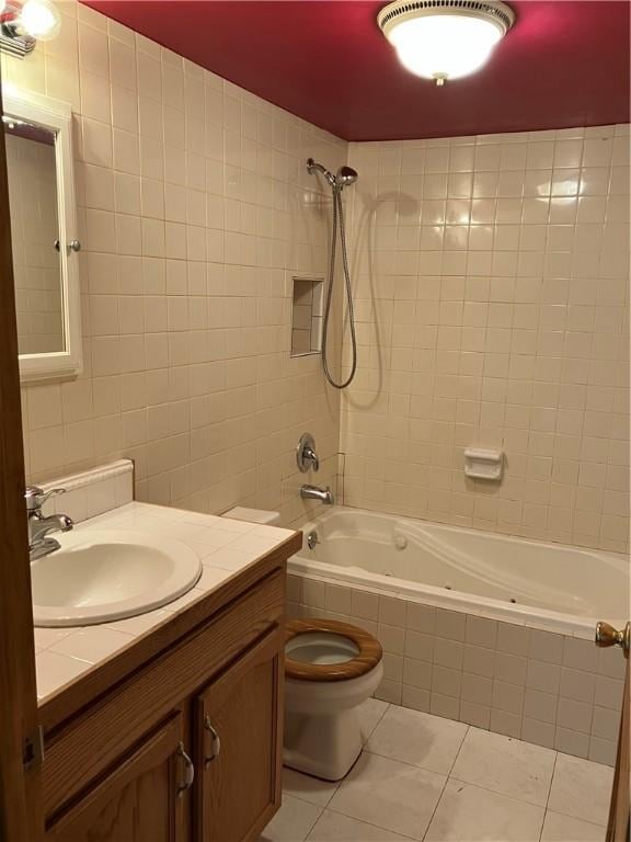 113 Filer Ln, Clay Twp, PA 16001 - bathroom with tile patterned floors, a combined bath / shower with jetted tub, tile walls, and vanity