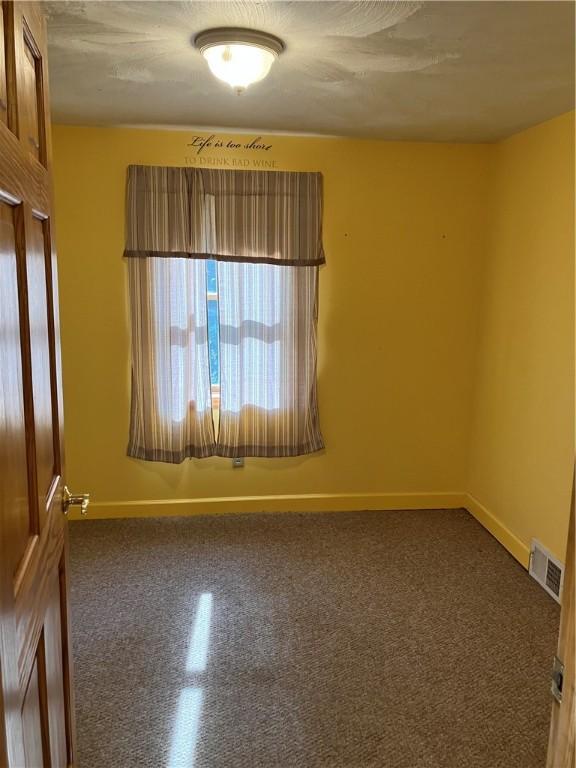 113 Filer Ln, Clay Twp, PA 16001 - unfurnished room with baseboards and carpet flooring