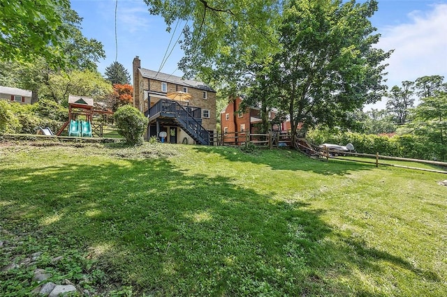 304 Fieldbrook Dr, Mt Lebanon, PA 15228 - view of yard with stairs, a playground, and a deck