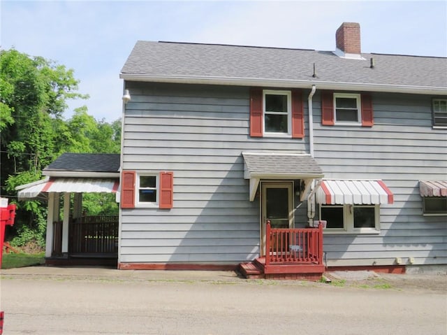 289 Sheridan Ln, Carmichaels/Cumblnd, PA 15351 - view of front of property featuring a chimney and roof with shingles