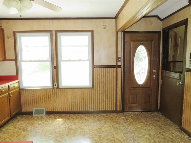 289 Sheridan Ln, Carmichaels/Cumblnd, PA 15351 - foyer entrance with a ceiling fan, light floors, wallpapered walls, and crown molding