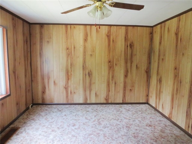 289 Sheridan Ln, Carmichaels/Cumblnd, PA 15351 - carpeted empty room with ceiling fan and wooden walls