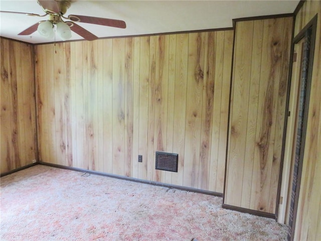 289 Sheridan Ln, Carmichaels/Cumblnd, PA 15351 - carpeted spare room featuring wood walls and a ceiling fan
