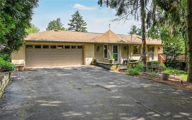 116 Parkfel Ave, Mccandless, PA 15237 - ranch-style house featuring brick siding, asphalt driveway, and a garage