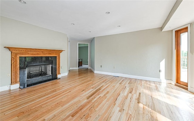 116 Parkfel Ave, Mccandless, PA 15237 - unfurnished living room with light wood-style floors, a fireplace, and recessed lighting